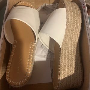 White platform heels